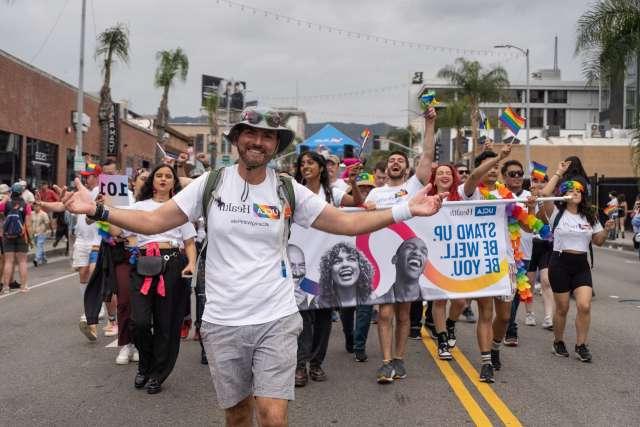 Daniel Kasprowicz leads UCLA Health staff walking in the 53rd annual LA Pride Parade on Sunday