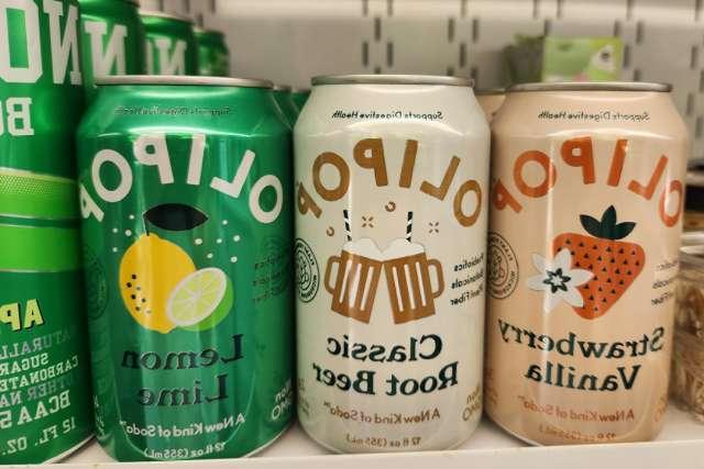 Olipop brand prebiotic sodas on a shelf.
